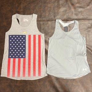 2 girls medium Under Armour tanks